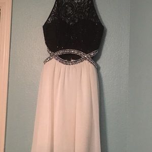 Speechless white and black evening gown.
